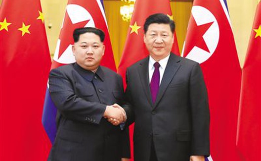 习近平同朝鲜劳动党委员长、国务委员会委员长金正恩举行会谈